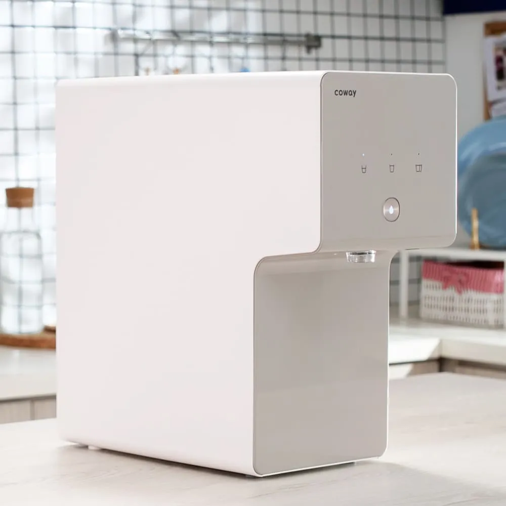 Coway water purifier in a bright modern family kitchen